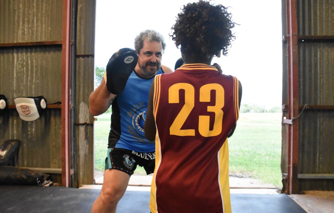 Muay Thai instructor David Flood spent one-on-one time with the young people building their confidence at the first session. 