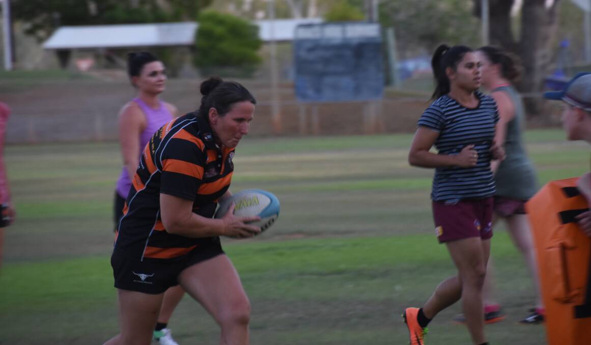 The women's rugby sevens had their first game of the season tonight, and after a quick warm up they split into teams. 