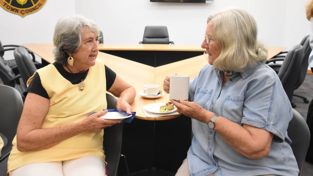 Shirley Ashworth and Barbara Ambjerg Pedersen chat over tea and scones at the annual Katherine Town Council Senior Citizens morning tea. 