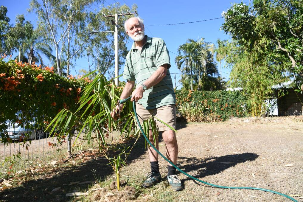 DISMAL WET: Weather enthusiast Jim Mathieson has spent more time this year watering his garden following a poor wet season. Like the rest of the town, he is also dealing with water restrictions. 