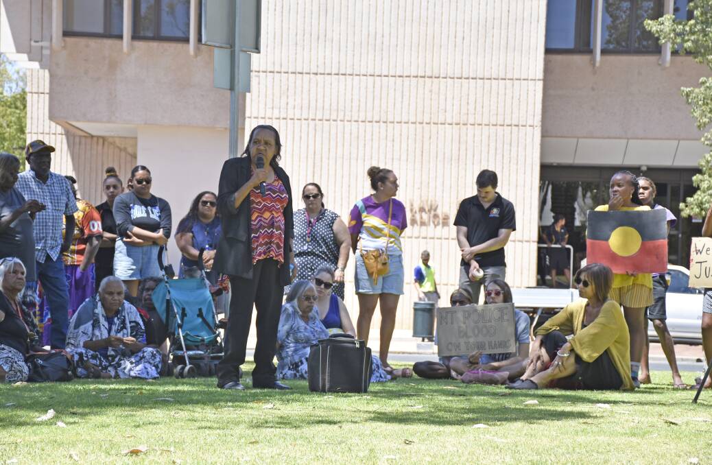 Youth worker and the Central Land Council's deputy chair Barbara Shaw speaks at a protest yesterday outside Police Headquarters in Alice Springs. Picture: Central Land Council. 