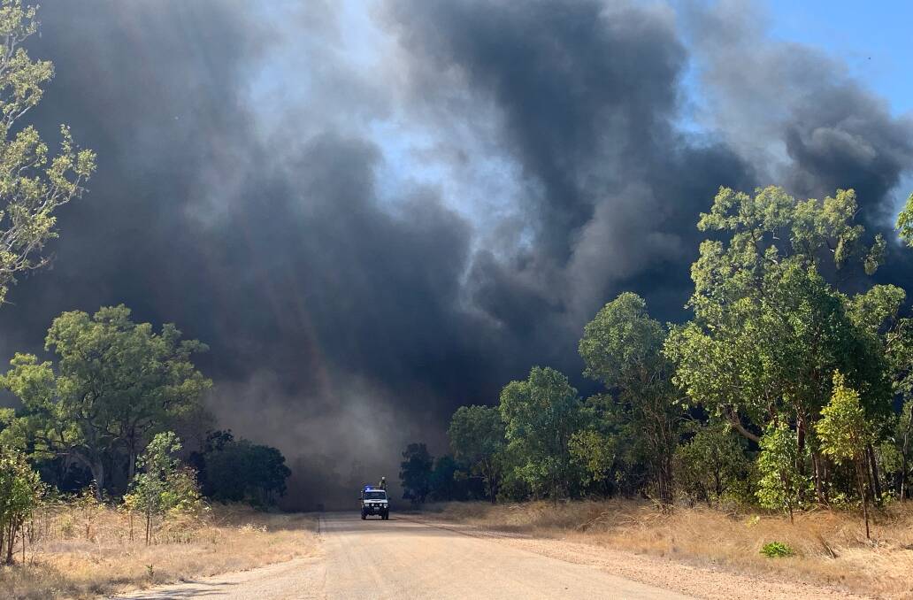 A raging fire took hold of tyres near the Katherine Speedway track, yesterday. Picture: 