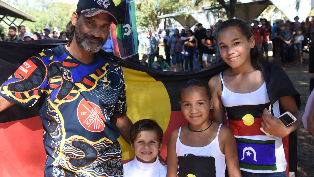 Terry Gillett, with his children, Damien, Braelee and Tamalia walked in the march. 