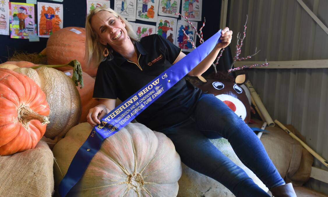 Heather Dingle with her Giant Pumpkin. 