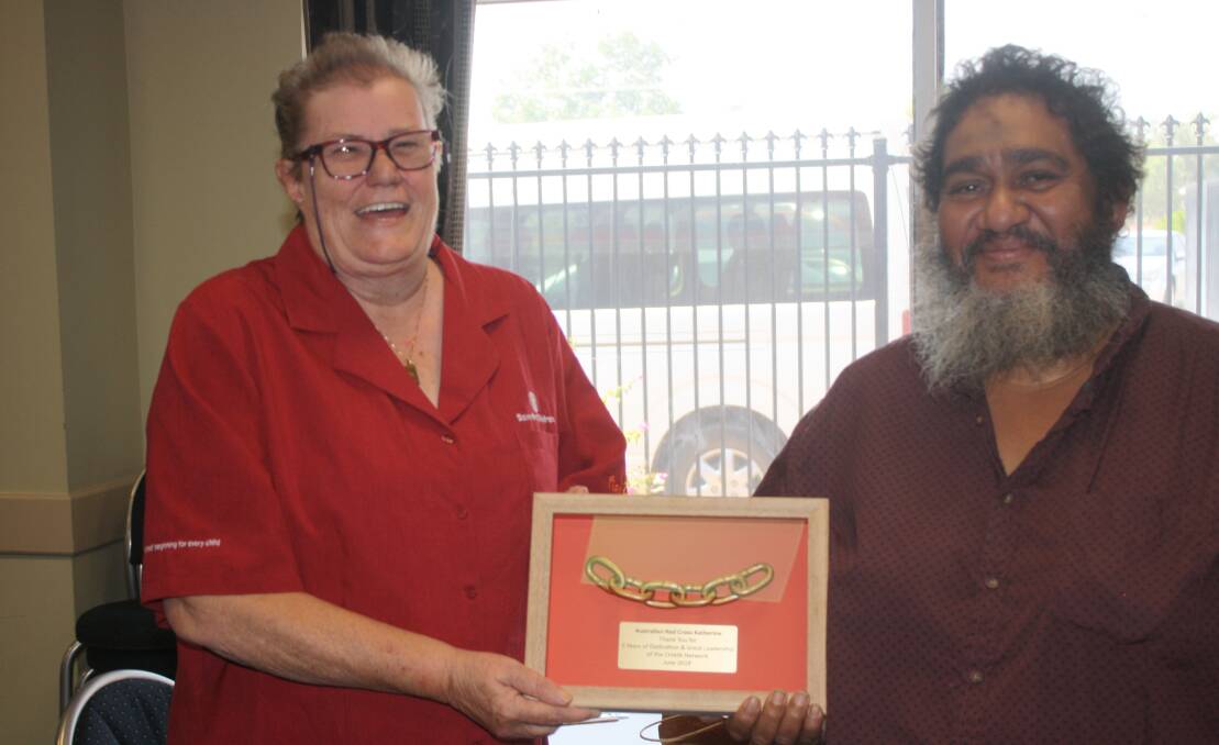 Bev Patterson from Save the Children formally acknowledged Red Cross' contributions and support of the network with a plaque. Stan Law received the gift on behalf of the Red Cross organisation.