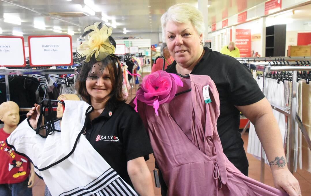 Jackie Maynard and Cheryl Walton at the Salvation Army charity store in Katherine have plenty of dresses and fascinators ready for race day. 