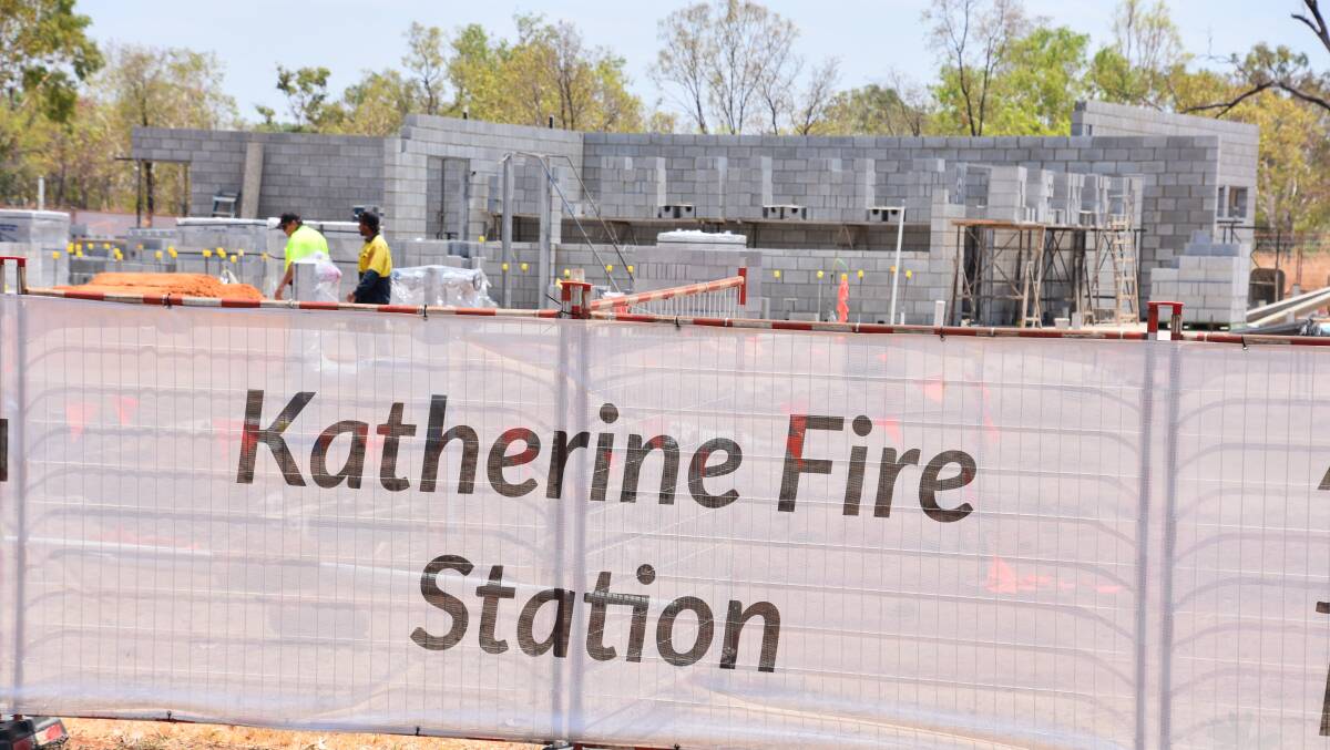 WALLS UP: Tradies have been working in 40 degree heat to construct the new fire station. 