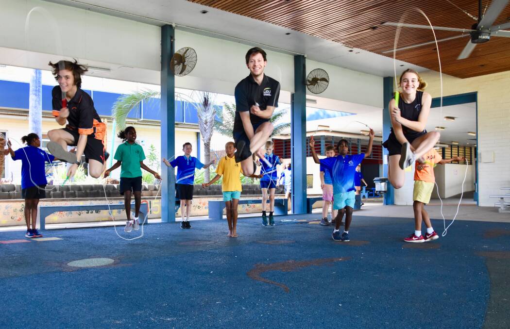 Calan Pridham, world champion Luke Boon and Hermine Strohmayr, jumped into Katherine today to teach Clyde Fenton students some jump rope tricks.