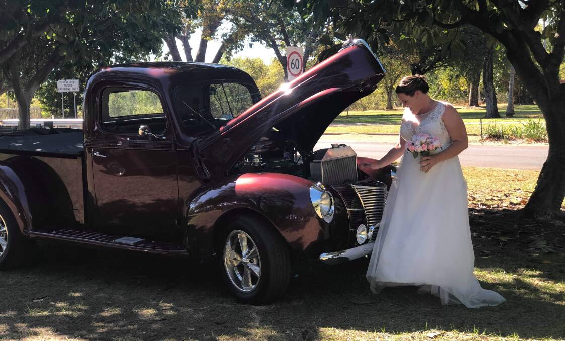 PICTURE PERFECT: Kaccie Davidson tied the knot on Saturday July 6, but had time before the ceremony to sneak in a photo shoot at an annual Katherine car show. Picture: Supplied. 