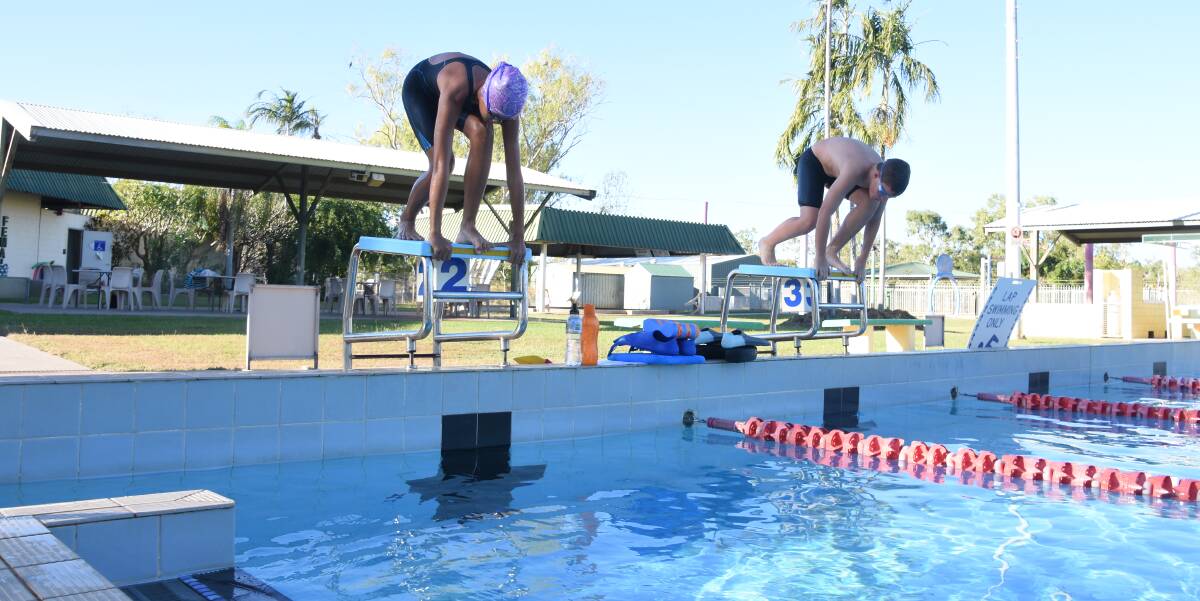 Regardless of the weather in the Top End, the young athletes are happy to jump into the pool. 