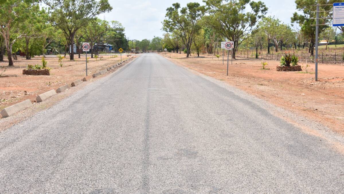 CONTRAST: At the Kalano boundary line a smooth new road had been laid. 