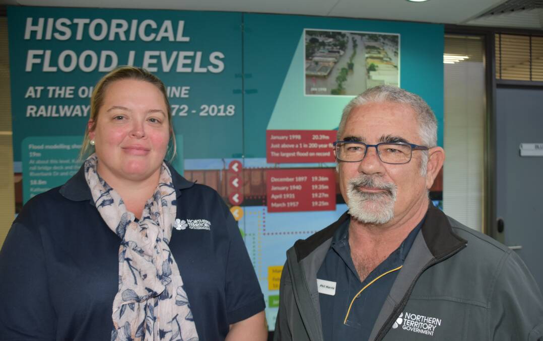 PROVIDING ASSURANCE: A recent community consultation at the Woolworths Complex saw about 200 people access flood mitigation information from DIPL's Claire Brown and Phil Harris. 