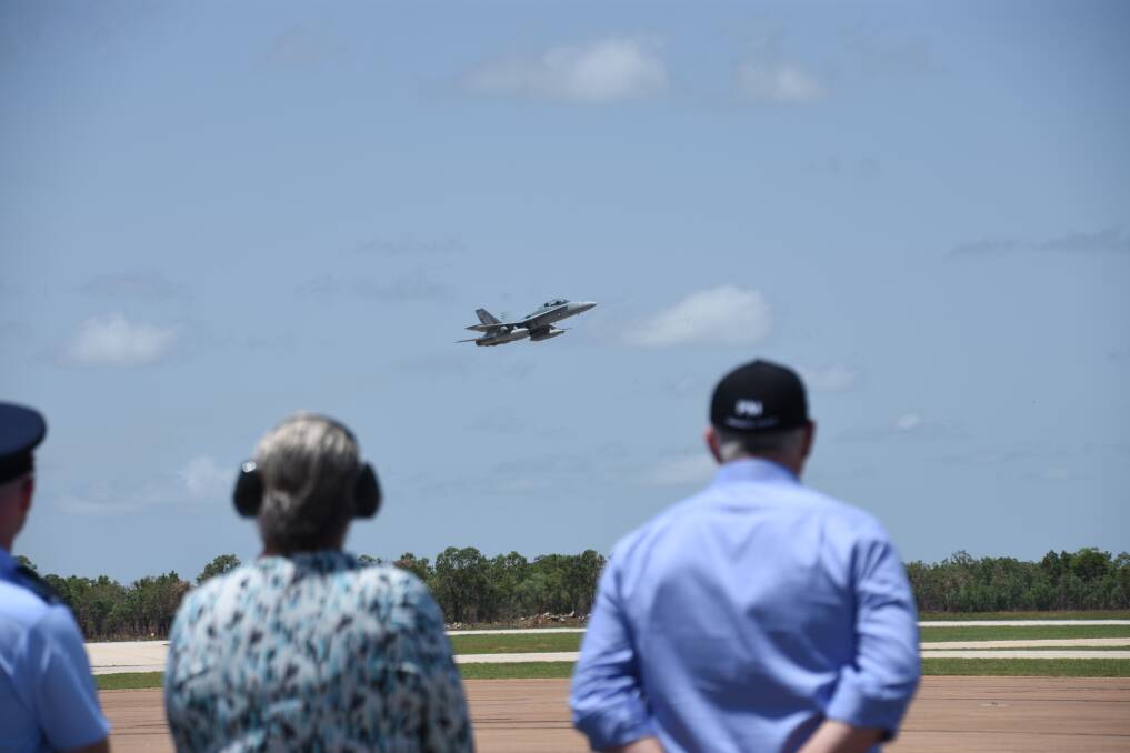 Prime Minister Scott Morrison and Sentator for the NT Sam McMahon watch the ageing jets take off at RAAF Base Tindal. 