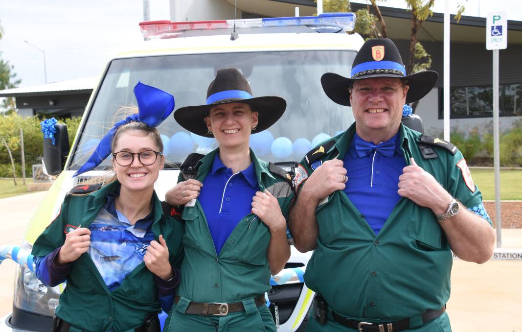 STANDING STRONG: In a show of support, intern paramedic Georgia Thompson, St John area manager Ashlee Elton and paramedic Steve Rudder have "gone blue" for Dolly's Dream. 