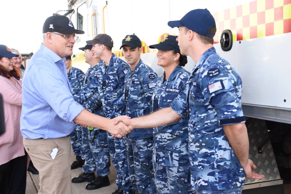 Prime Minister Scott Morrison meets RAAF Base Tindal personel today as he announces a $1.1 billion announcement to expand the base. 