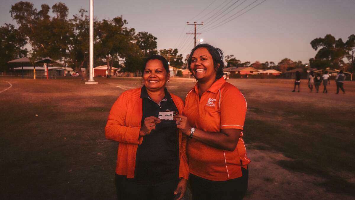 SWITCHED ON: Minister for Indigenous Affairs and Member for Arnhem, Selena Uibo turned on the lights with Roper Gulf Regional Council Deputy Mayor Helen Lee at Barunga Festival. Picture: Supplied. 