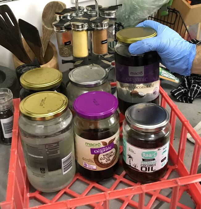 Jars were found filled with cannabis oil, police allege. Pictures: NT Police.