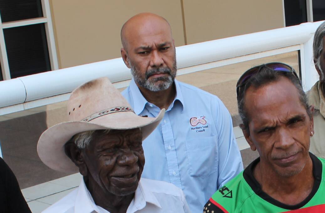 Joe Morrison, rear, with members of the Wubalawun group after their native title victory last month.