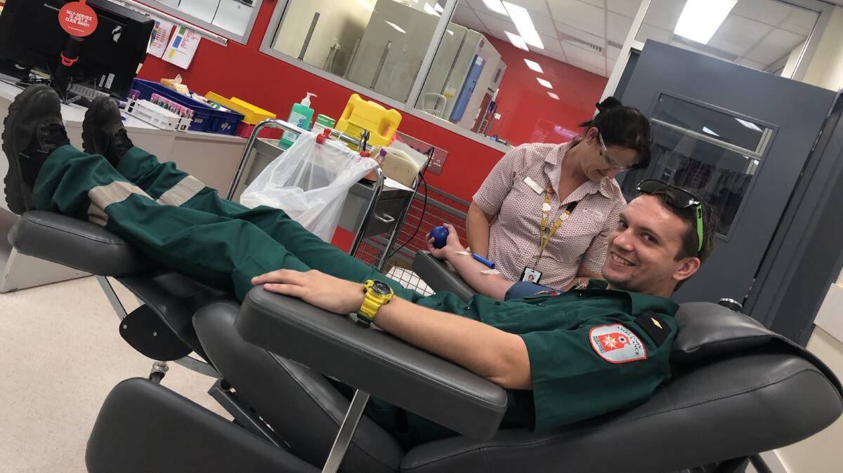Giving blood for the first time, St John Ambulance NT paramedic Troy Jones said donating alongside his colleagues was a rewarding experience. Picture: supplied.