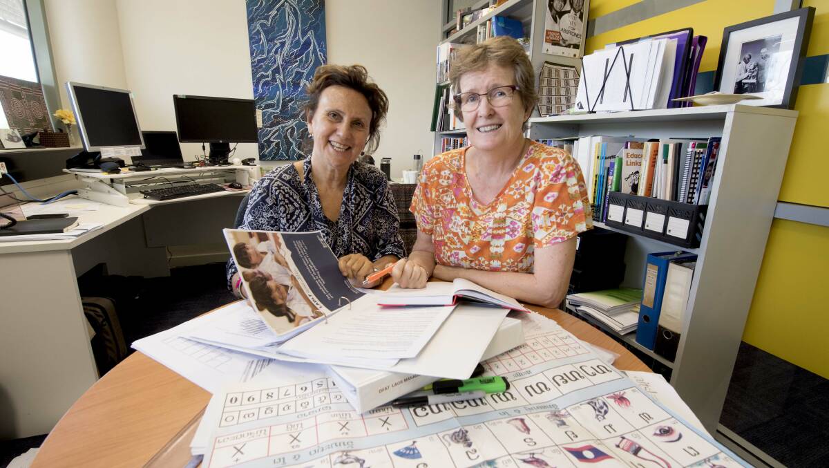 STUDYING UP: Dr Michele Willsher and Professor Sue Shore prepare for departure to Lao.
