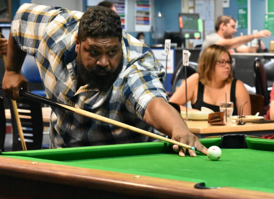 EYE ON THE BALL: The 8-Ball tournament was tightly contested on the weekend. 