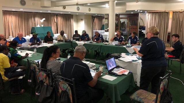 
FOOTY FOCUS: Attendees at the AFL Champions Forum in Katherine discuss development of a new men’s football competition in the Roper Gulf region.