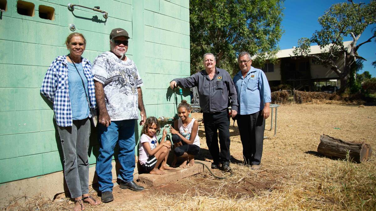 Kalano Community Deputy CEO Alan Mole (second from right) with community members. Picture: supplied.
