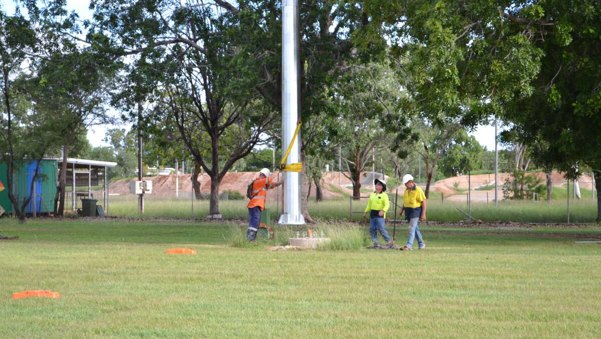 UP THEY GO: The new light towers are installed. Picture: Supplied.