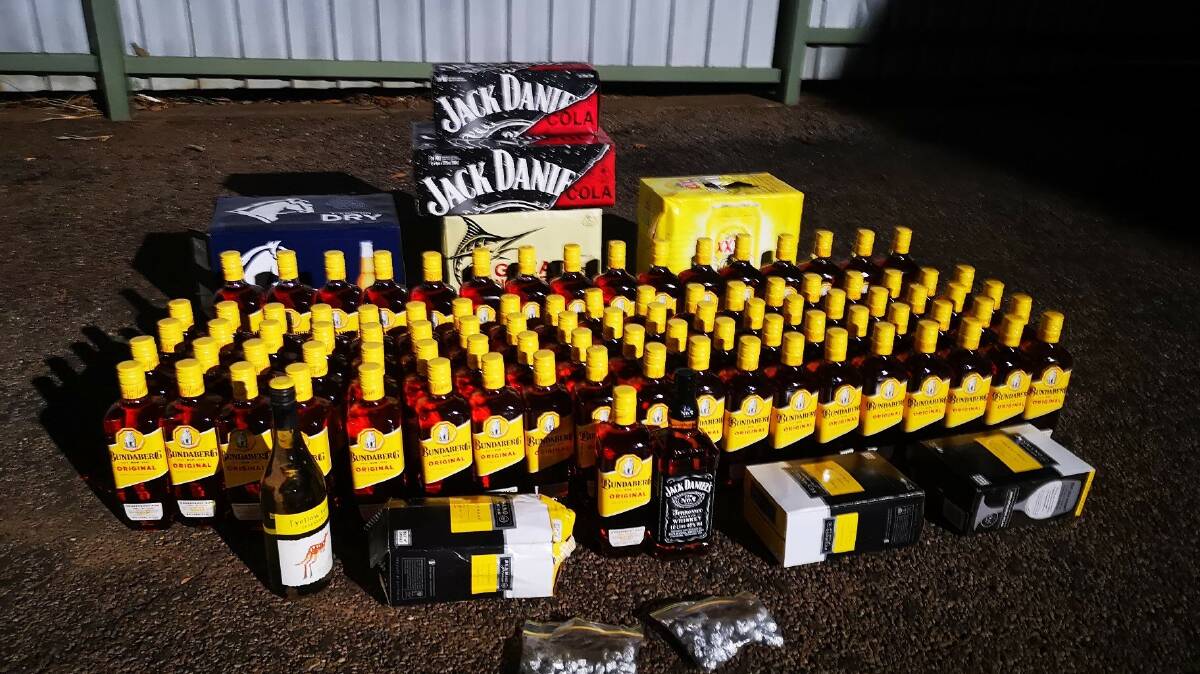 Just one of the huge hauls of alcohol police have made in recent weeks, this one at Daly River last month. Picture: NT Police.