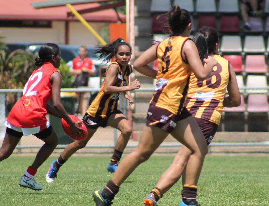 The Big Rivers Hawks Under 18s girls team are on the road most weekends traveling to AFL competition in Darwin during the wet season.