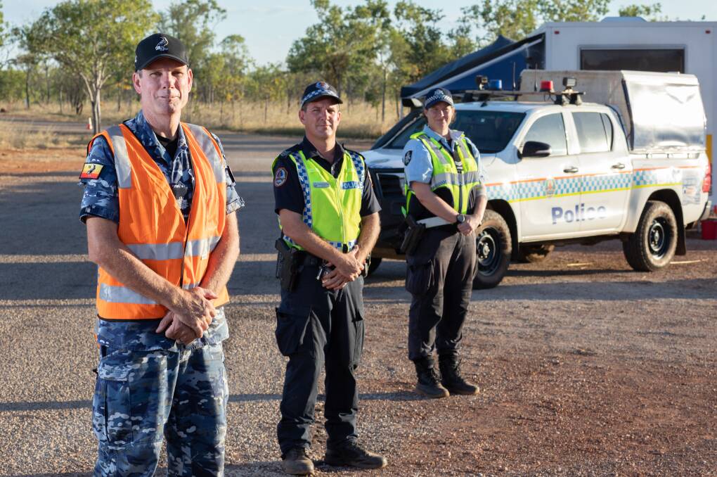 RAAF airman, Warrant Officer Graham Docking with Sergeant Jeremy Brunton of the NT Police and Detective Senior Constable Kerri O'Reilly of the Australian Federal Police to operate a biosecurity checkpoint between the town of Katherine and Manbulloo Station, NT. Picture: Defence Media.