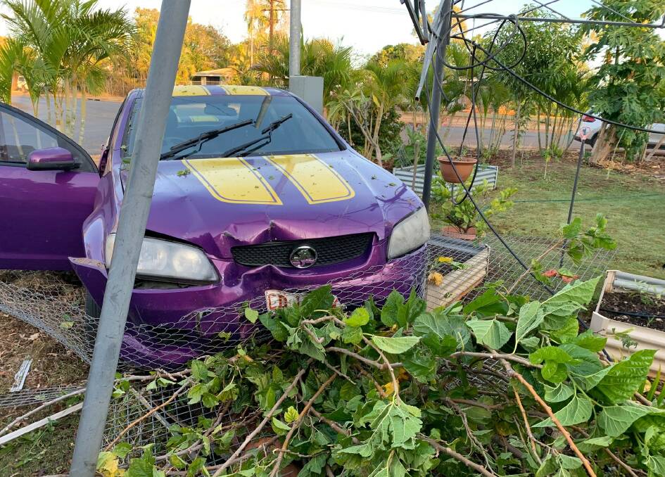 The speeding Commodore crashed through the front fence of this Katherine East home. Picture: NT Police.