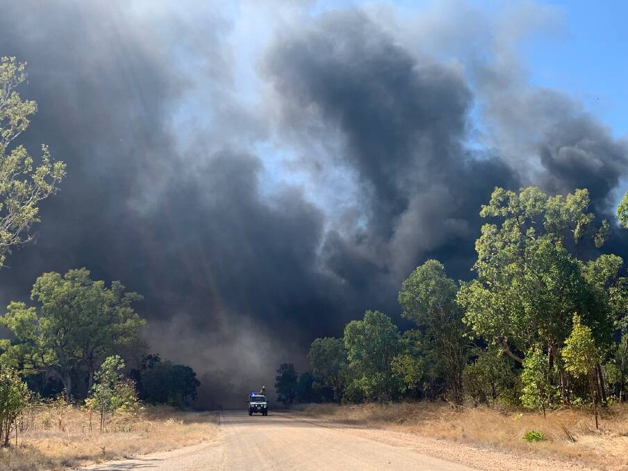 PUBLIC DANGER: Almost 300 tonnes of old tyres illegally stored next to the showgrounds went up in flames with acrid, black smoke covering Katherine South for days.