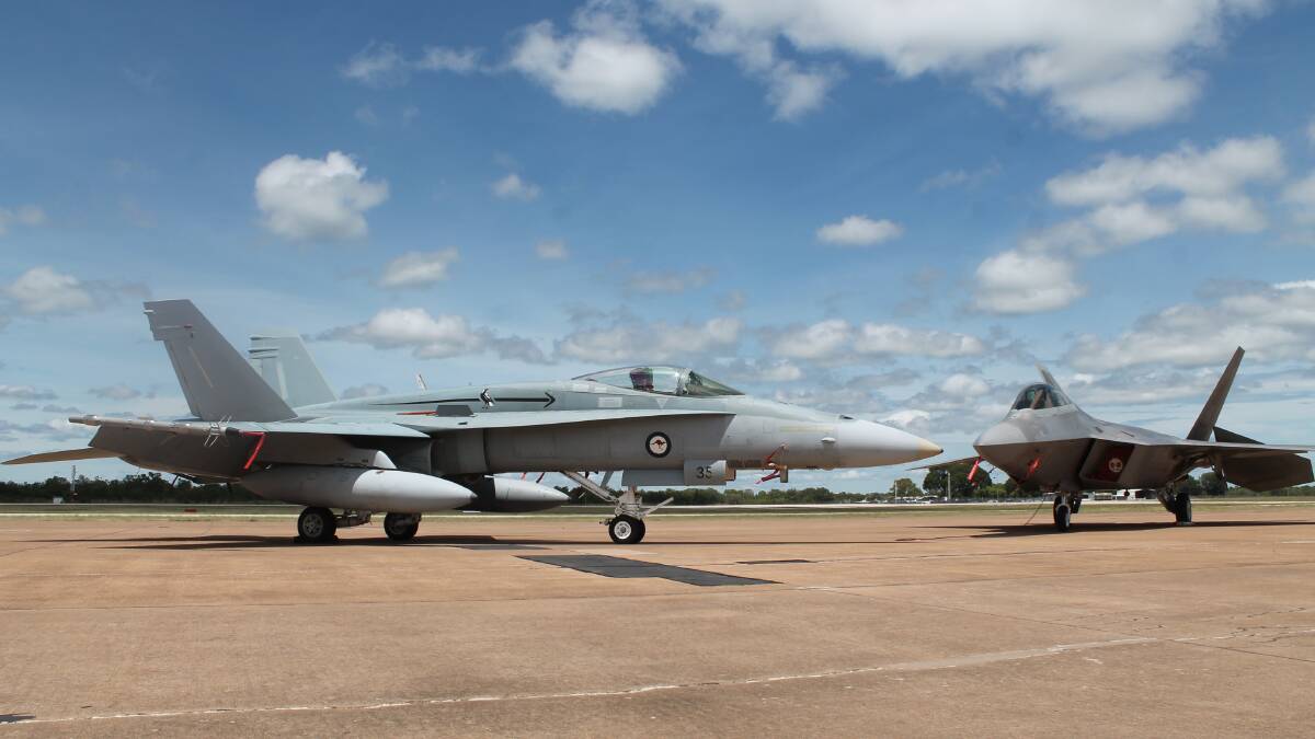 FEBRUARY VISIT:  The F22 Raptor (right), the most advanced fighter aircraft in the world, made a visit to Tindal.