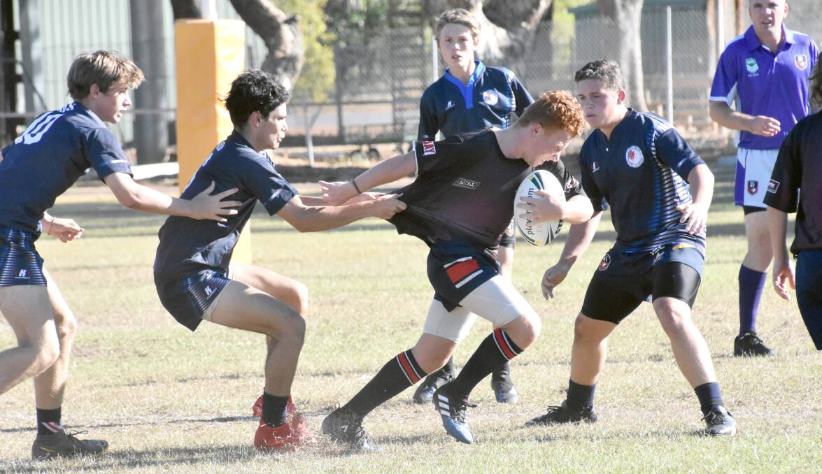 HOME GAME: Katherine High Rugby League team took on Taminmin College last week in Katherine. Although close until half time, it was ultimately won by Taminmin. 