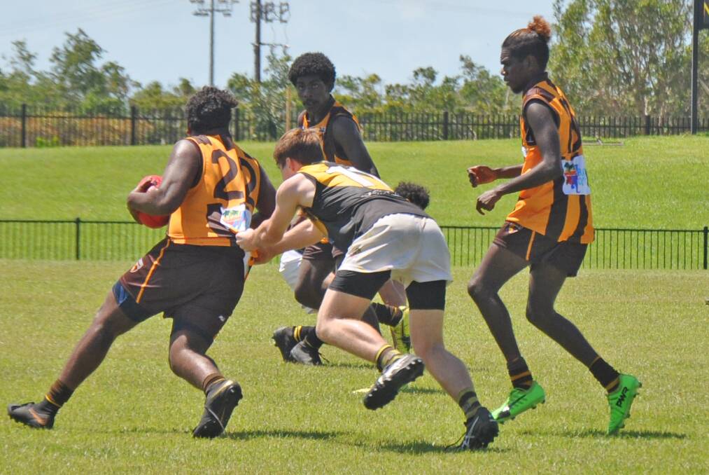 The Big River Hawks' boys team lost to Waratah in Darwin yesterday. File picture of a game against Nightcliff last week.