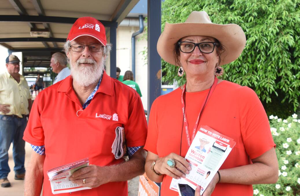 John King and Jo Nicol are handing out how to vote cards for the ALP.