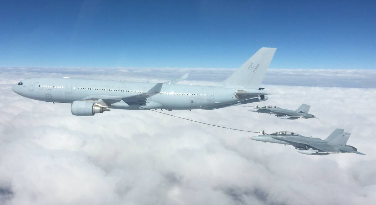 A KC-30A Multi-Role Tanker Transport refuelling F/A-18 Hornets during Exercise Diamond Storm.