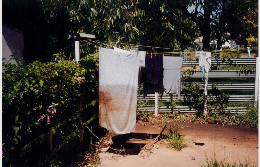 SHARED PICTURE: The dirty half of the towel clearly shows the level of the Katherine River which wrecked this Giles Street unit in 1998. Picture: Alice Nolan.