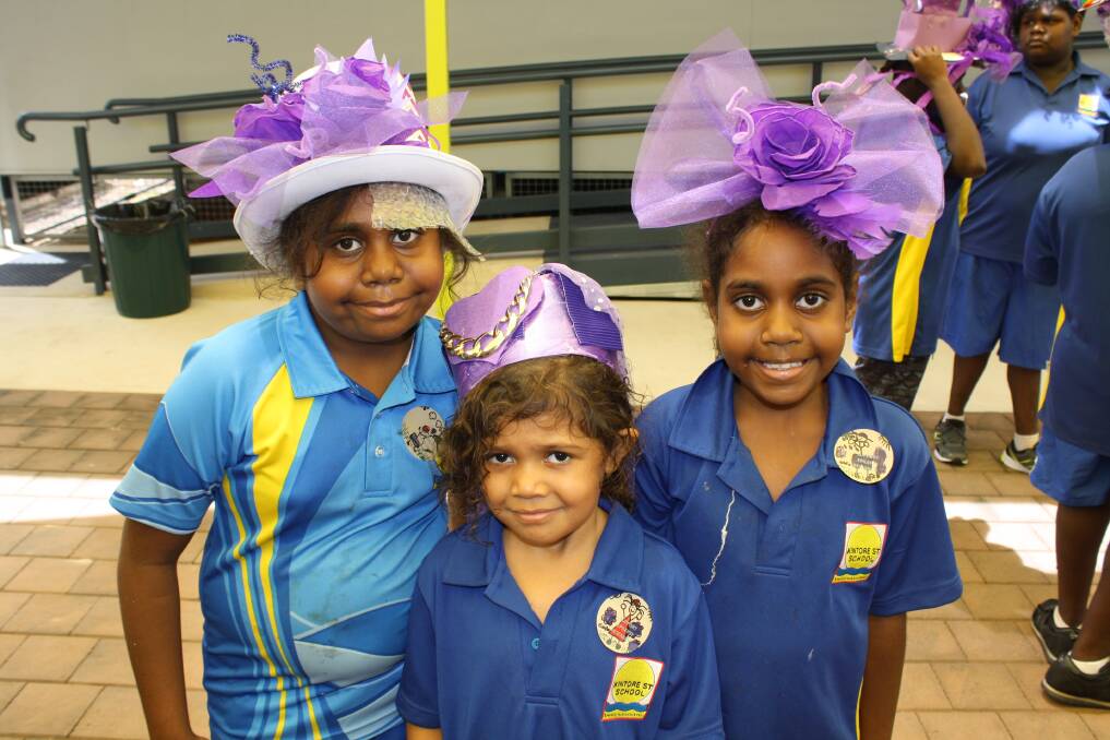 Donna, Marjory and Shanaya wearing their purple hats at Purple Hat Day.