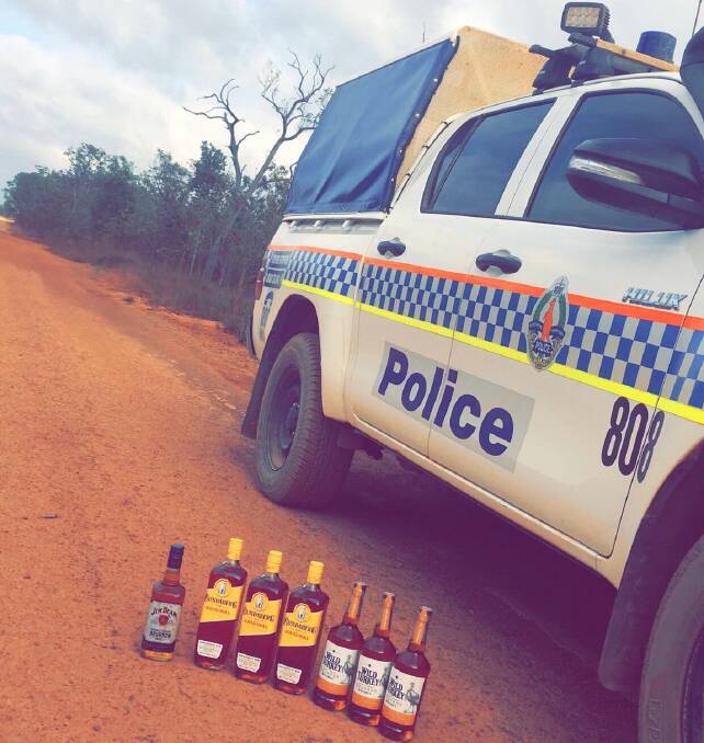 A stash of grog was found hidden in the bush near Wadeye. Picture: NT Police.