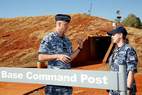 Air Commander Australia Air Vice-Marshal Steven Roberton, DSC, AM (left) talks to No. 17 Squadron Air Base executive officer Squadron Leader Nicole Clements outside the Air Base Command Post bunker during a visit to RAAF Base Tindal on Exercise Diamond Storm 2019. Picture: Defence Media.