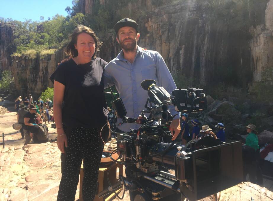 SHOOTING SCENES: Camera man Tim Walsh and directors assistant Emma Masters with just one of the many film cameras on set. 