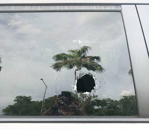 A rock broke the vehicle's side window. Pictures: supplied.