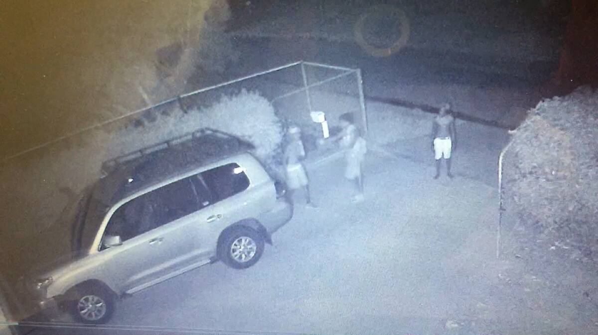CRIME SPIKE: A security video image of youths attempting to break into a Katherine home  from late last year.