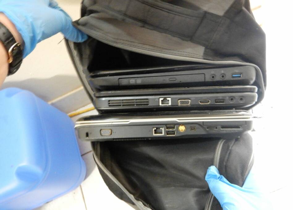 Some of the computers seized in yesterday's Katherine raid. Pictures: Australian Federal Police.