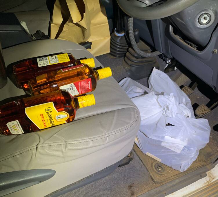 Bottles of alcohol were found inside the cars. Pictures: NT Police.