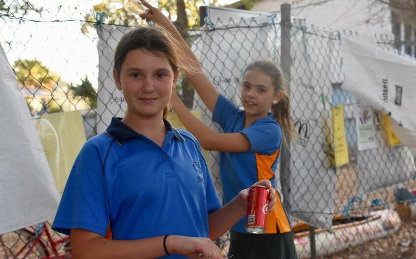 Local Girl Guides Kylie Lambert and Evie Arnott were part of a new recycling initiative in Katherine this year. Picture: Roxanne Fitzgerald.