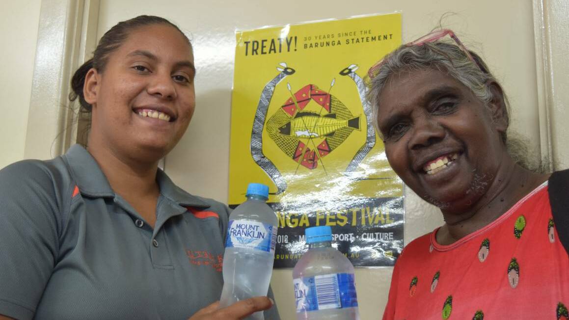 SAY NO TO SUGAR: Barunga store manager Amelita John and Traditional Owner and chair of the Bagala Store, Esther Bulumbara. The store reduced their sugary drink sales by 54% for the month of June. The store is now the only fully Aboriginal owned and operated community store in the NT. Picture: supplied.