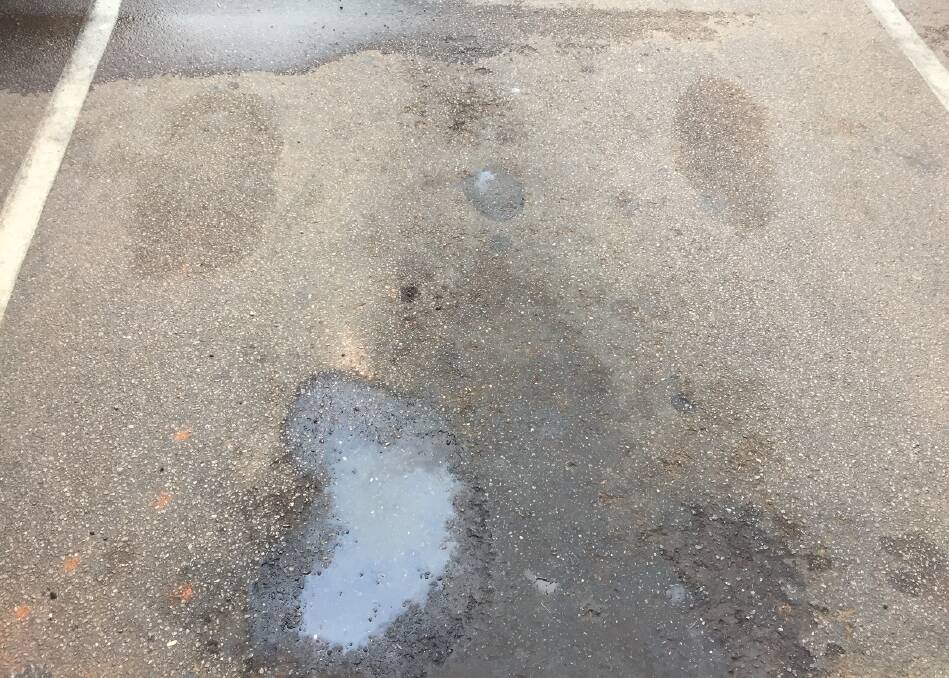 Evidence from a Katherine car park this morning of the absence of meaningful rain yet. Picture: Roxanne Fitzgerald.